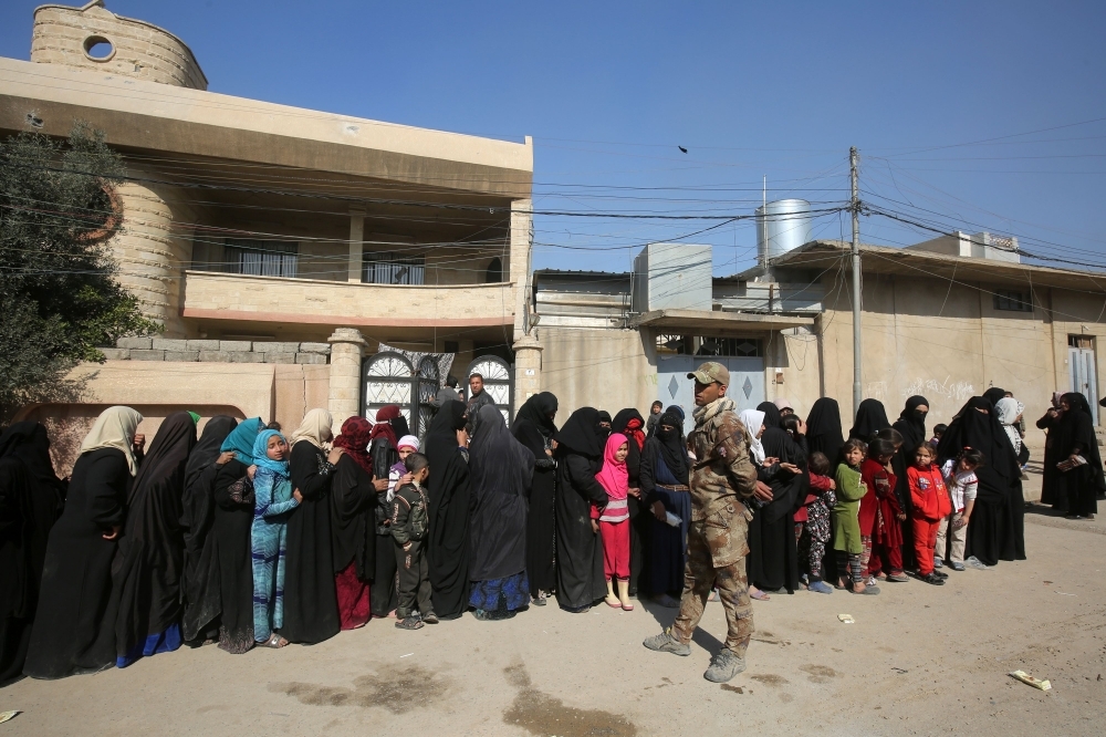 &rlm;جثث في شوارع الموصل ومدنيون تحت الأنقاض