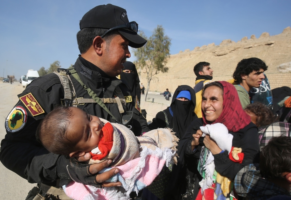 &rlm;جثث في شوارع الموصل ومدنيون تحت الأنقاض