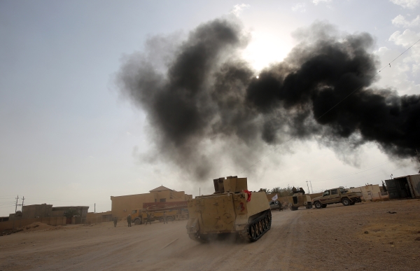 القوات العراقية والسورية تحاصر "داعش" في آخر معاقله بوادي الفرات