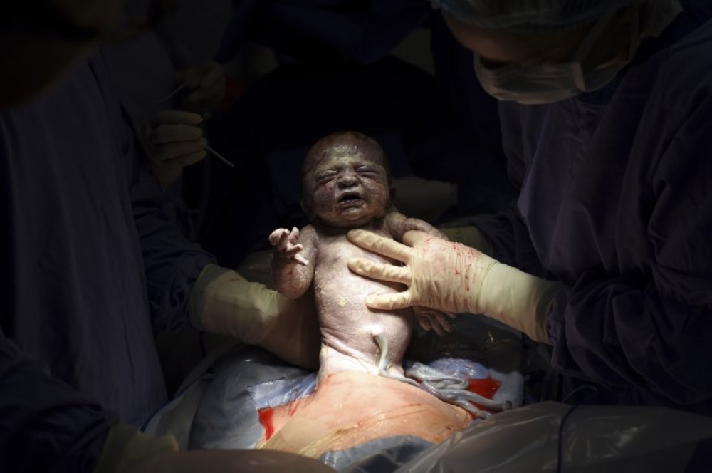 مهاجر وهاربة من داعش يفوزان بجائزة عالميةا