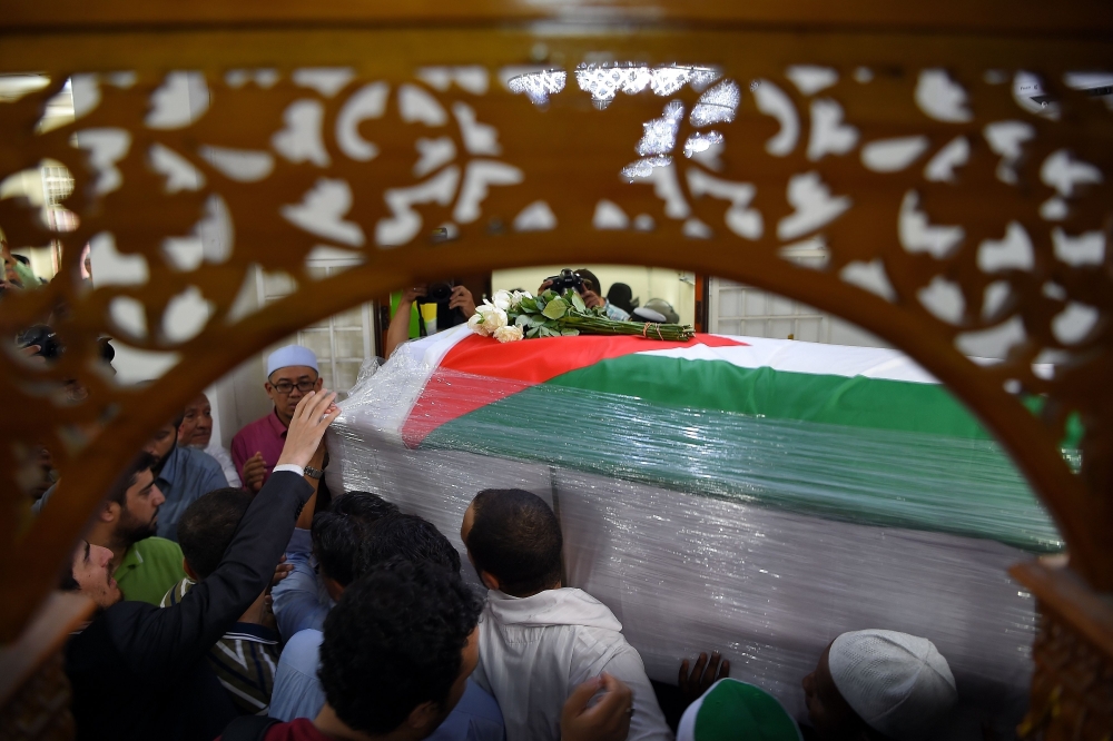 بالصور - تشييع جثمان العالم الفلسطيني المغدور فادي البطش في ماليزيا