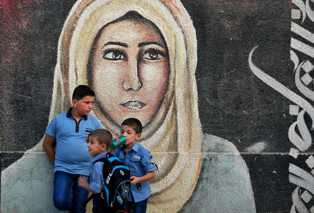 بالصور - بدء العام الدراسي بفلسطين.. حصار واحتلال وتقليص مساعدات واشنطن