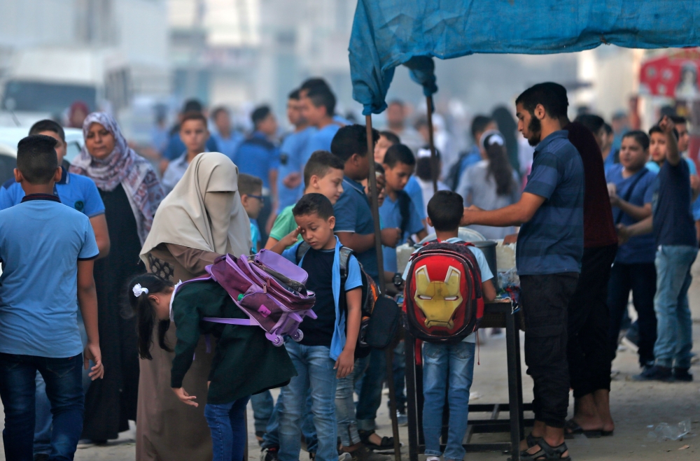 بالصور - بدء العام الدراسي بفلسطين.. حصار واحتلال وتقليص مساعدات واشنطن