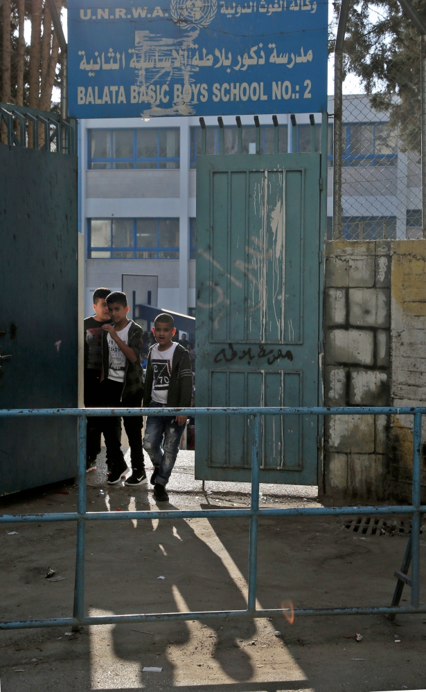 بالصور - بدء العام الدراسي بفلسطين.. حصار واحتلال وتقليص مساعدات واشنطن