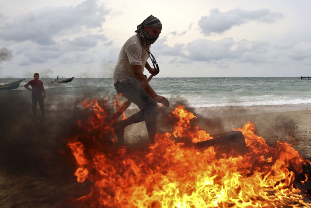 بالصور - الفلسطينيون ينتفضون ضد "يهودية الدولة" في ذكرى "انتفاضة الأقصى"