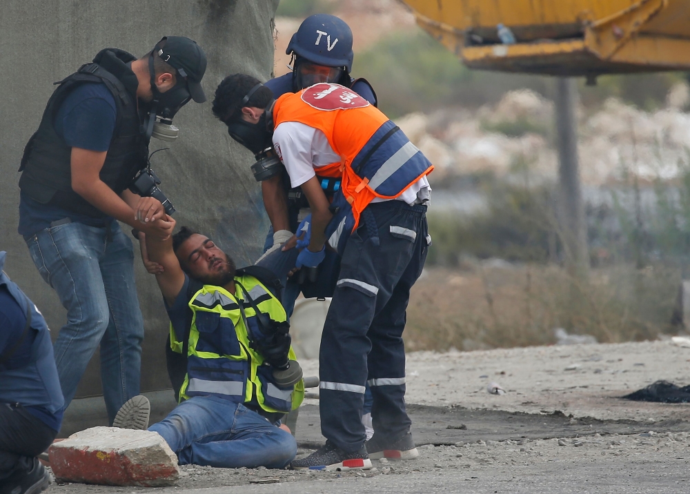 بالصور - الفلسطينيون ينتفضون ضد "يهودية الدولة" في ذكرى "انتفاضة الأقصى"