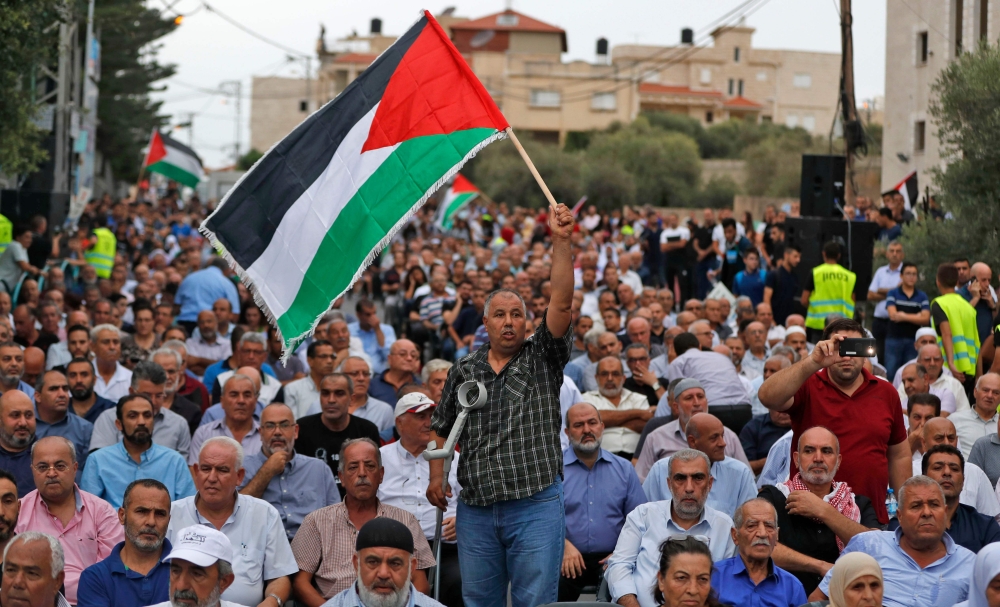 بالصور - الفلسطينيون ينتفضون ضد "يهودية الدولة" في ذكرى "انتفاضة الأقصى"