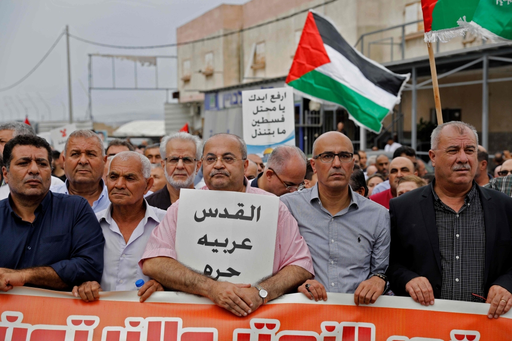 بالصور - الفلسطينيون ينتفضون ضد "يهودية الدولة" في ذكرى "انتفاضة الأقصى"