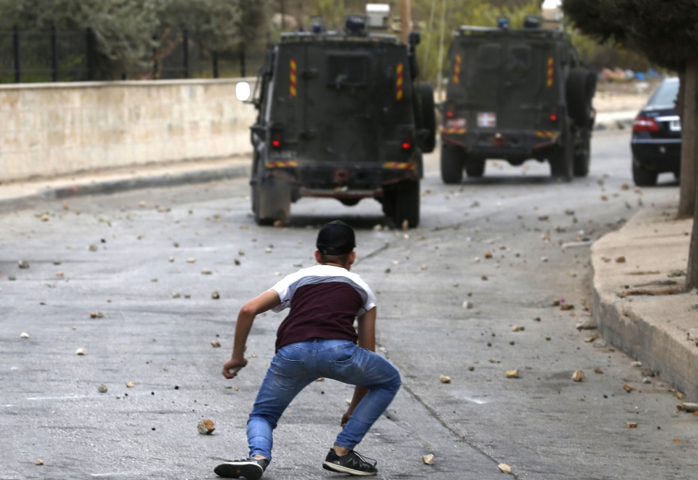 بالصور - الفلسطينيون ينتفضون ضد "يهودية الدولة" في ذكرى "انتفاضة الأقصى"