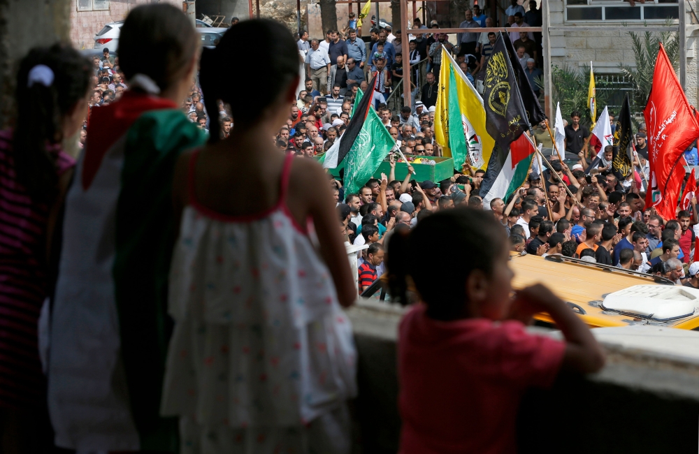 بالصور - الفلسطينيون ينتفضون ضد "يهودية الدولة" في ذكرى "انتفاضة الأقصى"