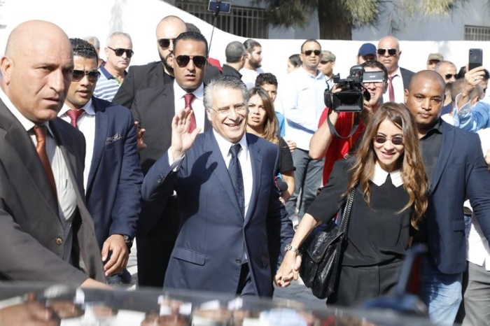 بالصور - التونسيون يصوتون في جولة الإعادة لانتخابات الرئاسة