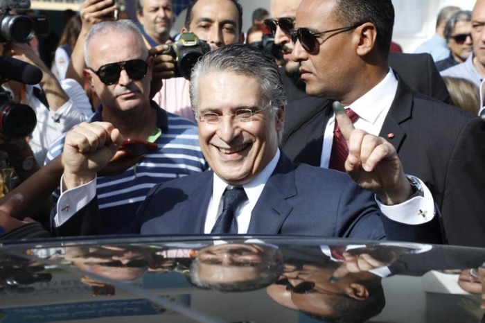 بالصور - التونسيون يصوتون في جولة الإعادة لانتخابات الرئاسة