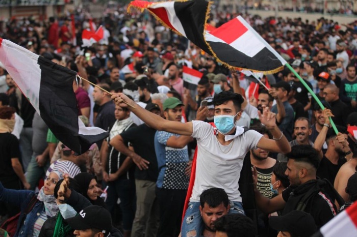 بالصور - 30 قتيلاً و1800 جريح في احتجاجات "جمعة إنهاء النفوذ الإيراني بالعراق"