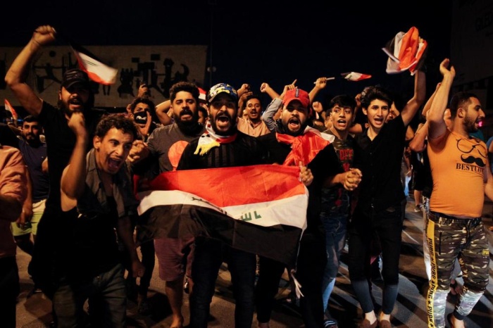 بالصور - 30 قتيلاً و1800 جريح في احتجاجات "جمعة إنهاء النفوذ الإيراني بالعراق"