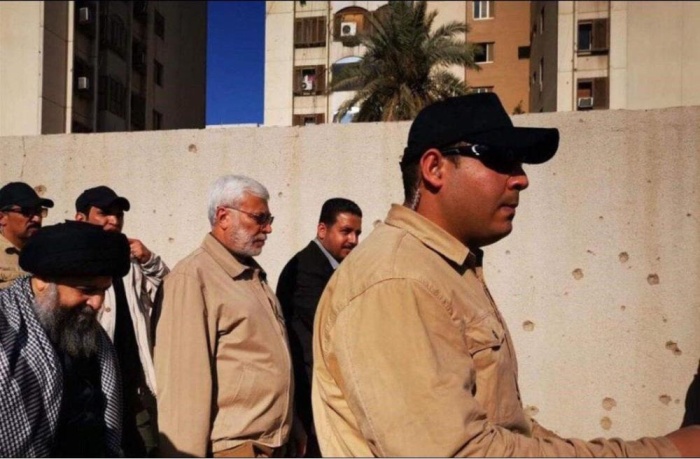 بالصور - ميليشيات تابعة لإيران تحاول اقتحام السفارة الأمريكية بالعراق