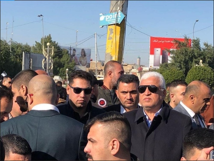 بالصور - ميليشيات تابعة لإيران تحاول اقتحام السفارة الأمريكية بالعراق