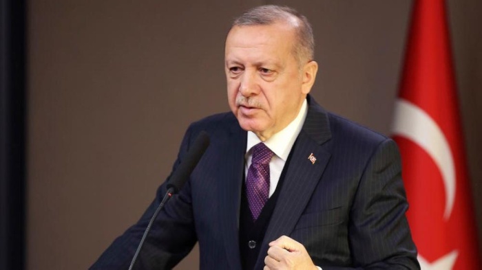 أردوغان يهدد باستخدام القوة بسوريا ويصر على بقاء قواته بليبيا