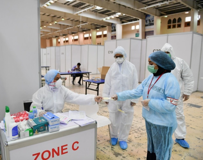 بالصور.. متطوعون في مكافحة كورونا: سنقدم الغالي والنفيس من أجل البحرين