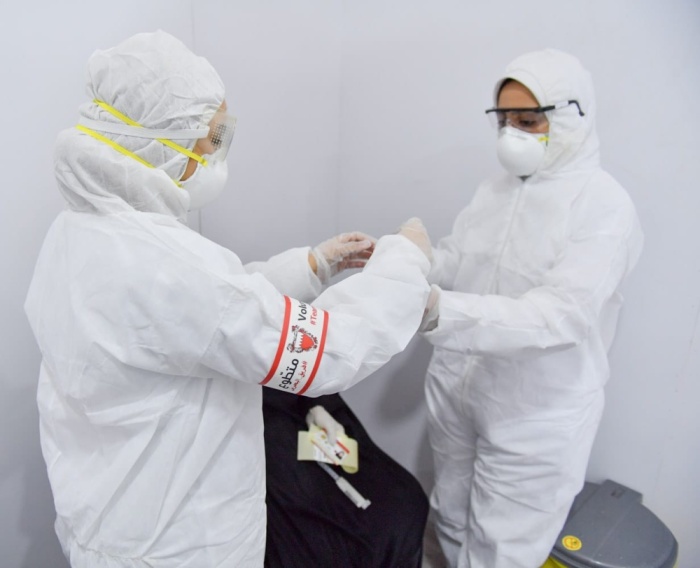 بالصور.. متطوعون في مكافحة كورونا: سنقدم الغالي والنفيس من أجل البحرين