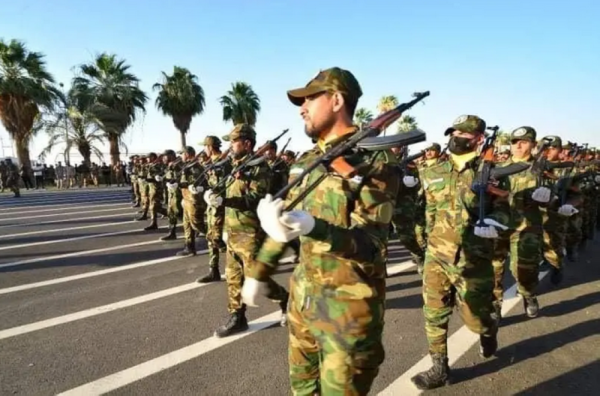 استعراض عسكري للحشد الشعبي في العراق.. بأسلحة إيرانية