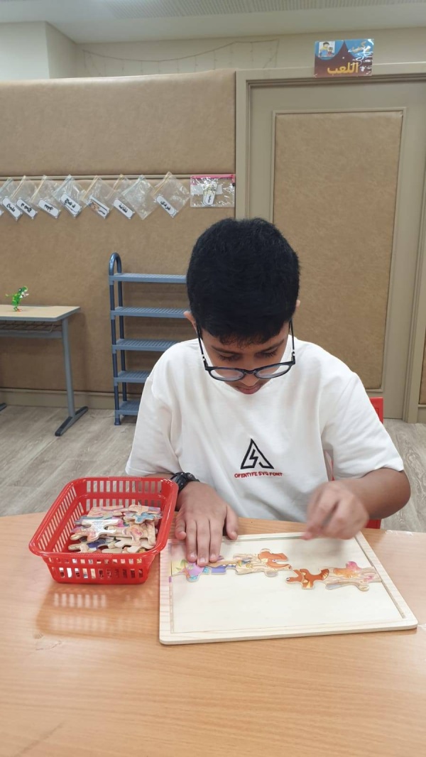 "محفوظ" ينتصر على التوحد ويبدع في القرآن والشعر والتكنولوجيا