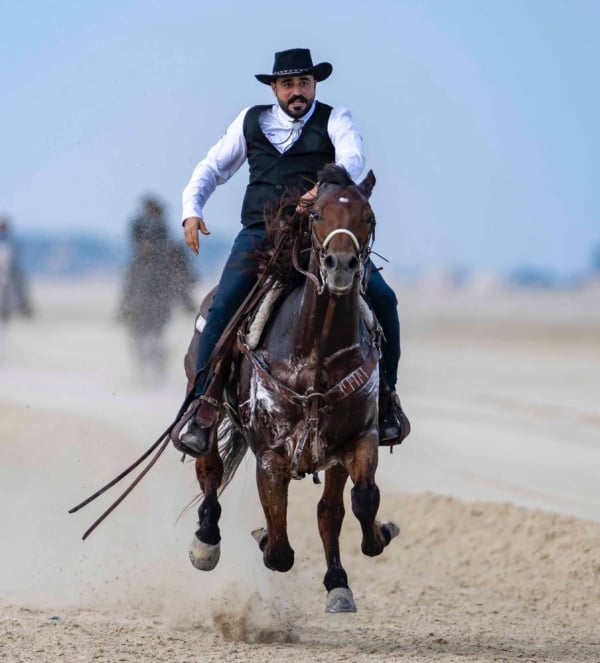 بالصور.. فعالية "الكشتة" تجذب محبي ركوب الخيل ورياضات الكاوبوي