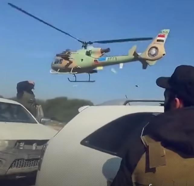 طيار سوري يغامر بطائرته المروحية بمروره من تحت أسلاك الكهرباء