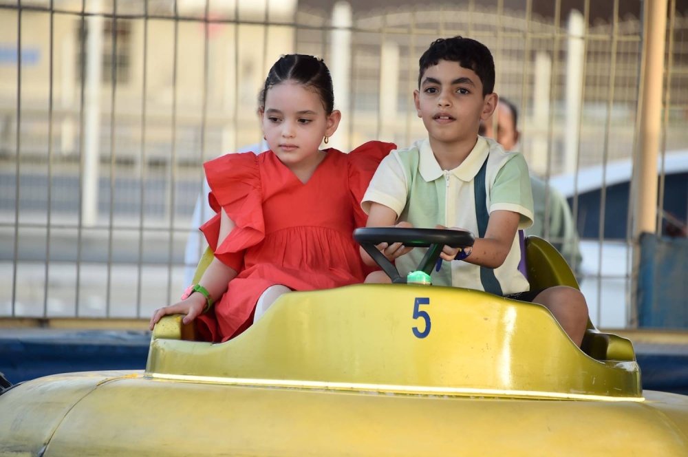 عدسة "الوطن" ترصد فرحة الأطفال بالعيد في الحدائق والمتنزهات والمجمّعات