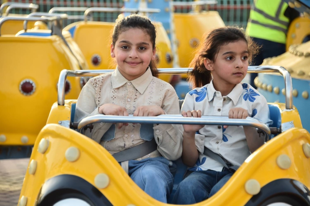 عدسة "الوطن" ترصد فرحة الأطفال بالعيد في الحدائق والمتنزهات والمجمّعات