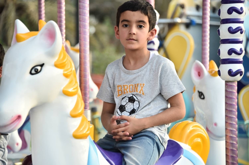 عدسة "الوطن" ترصد فرحة الأطفال بالعيد في الحدائق والمتنزهات والمجمّعات