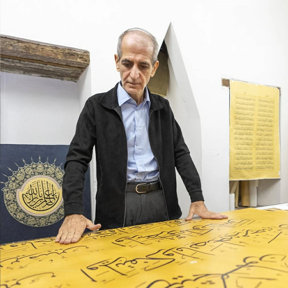 خطاط عراقي ينجز أكبر مصحف في العالم مكتوب يدوياً