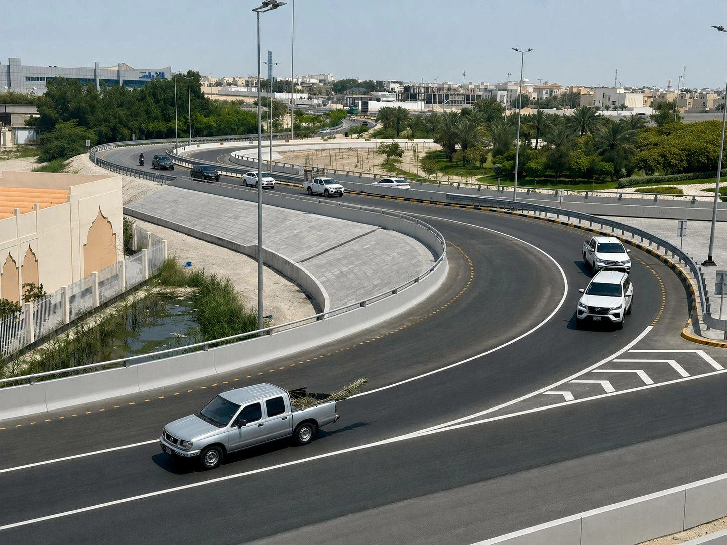 الانتهاء من توسعة منحنى الانعطاف من شارع الشيخ عيسى بن سلمان إلى شارع الجنبية 